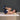 "man exercising with backrack pain relief device"