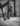 "man exercising with battle rope"