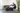 "Man exercising with Physical Company Evo Bench in black"