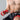 "Man using RDX- RB Professional Boxing Hand Wraps in red"